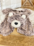 A plush brown bear baby blanket made by ClaraLoo with soft faux fur and crocheted accents.